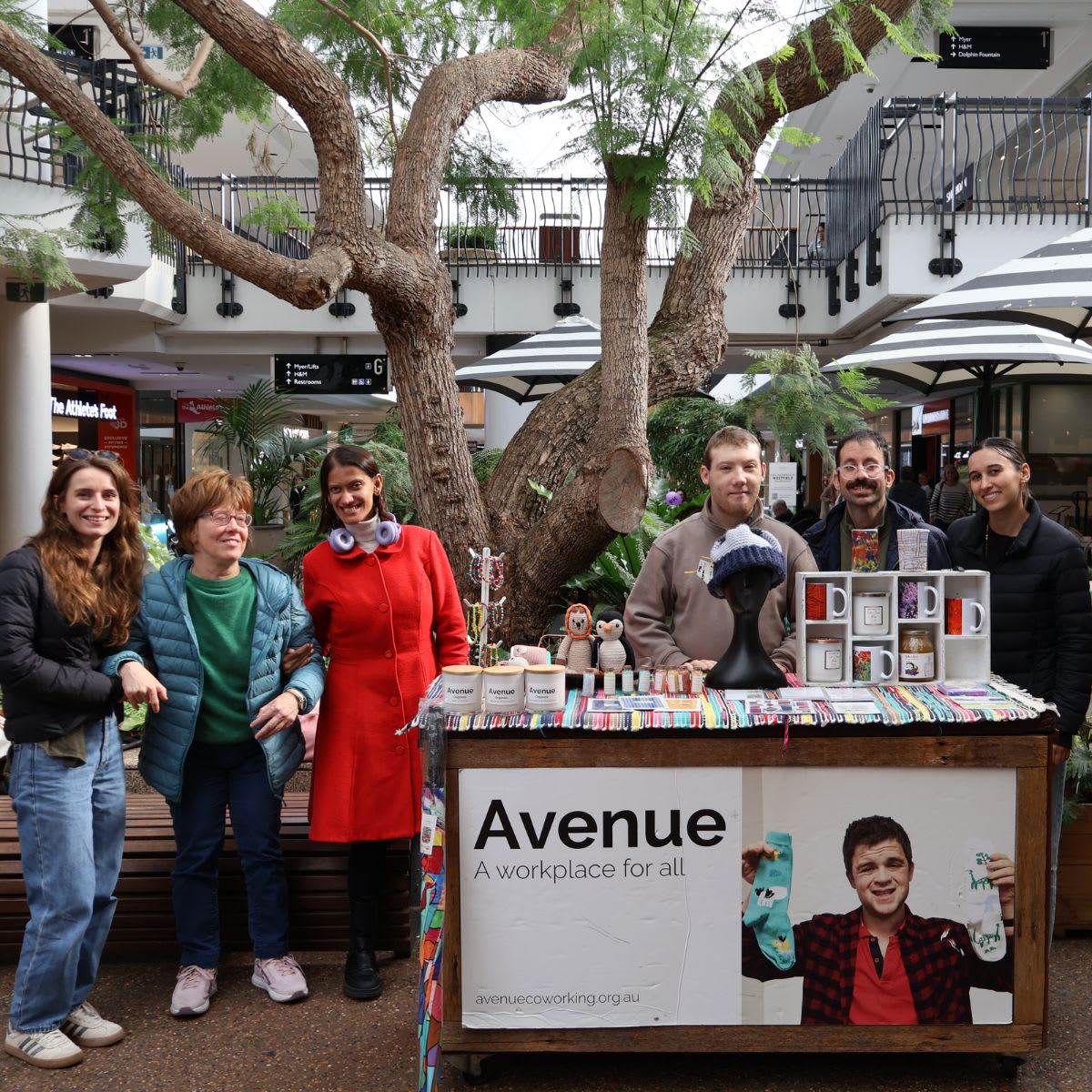 The Avenue staff around the cart