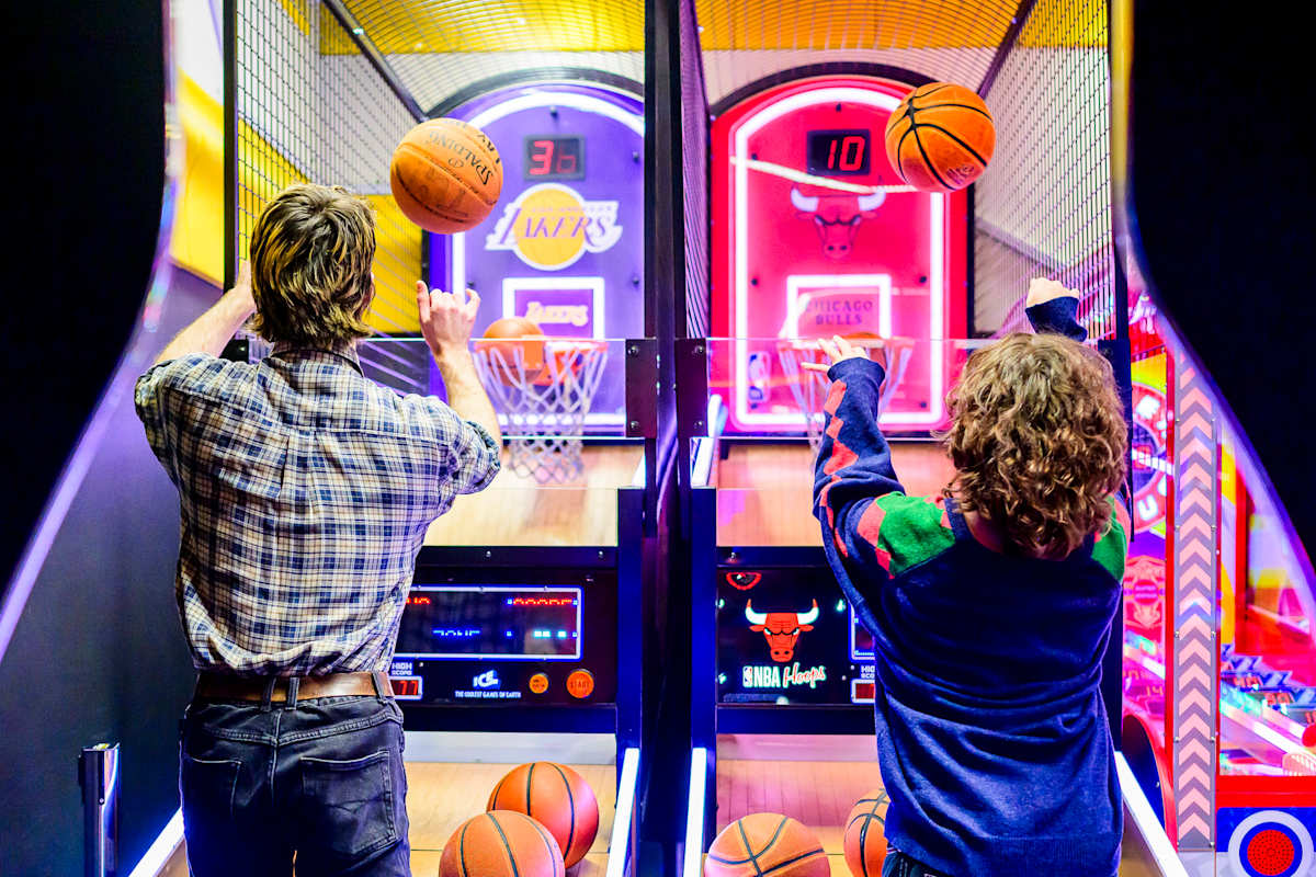 People playing basketball in Totally Game arcade