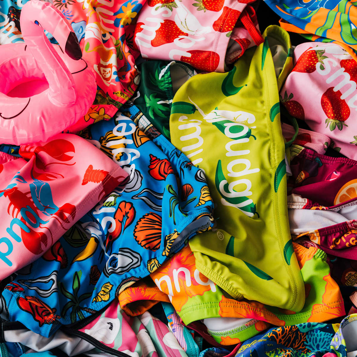 pile of Budgy Smugglers in different colours