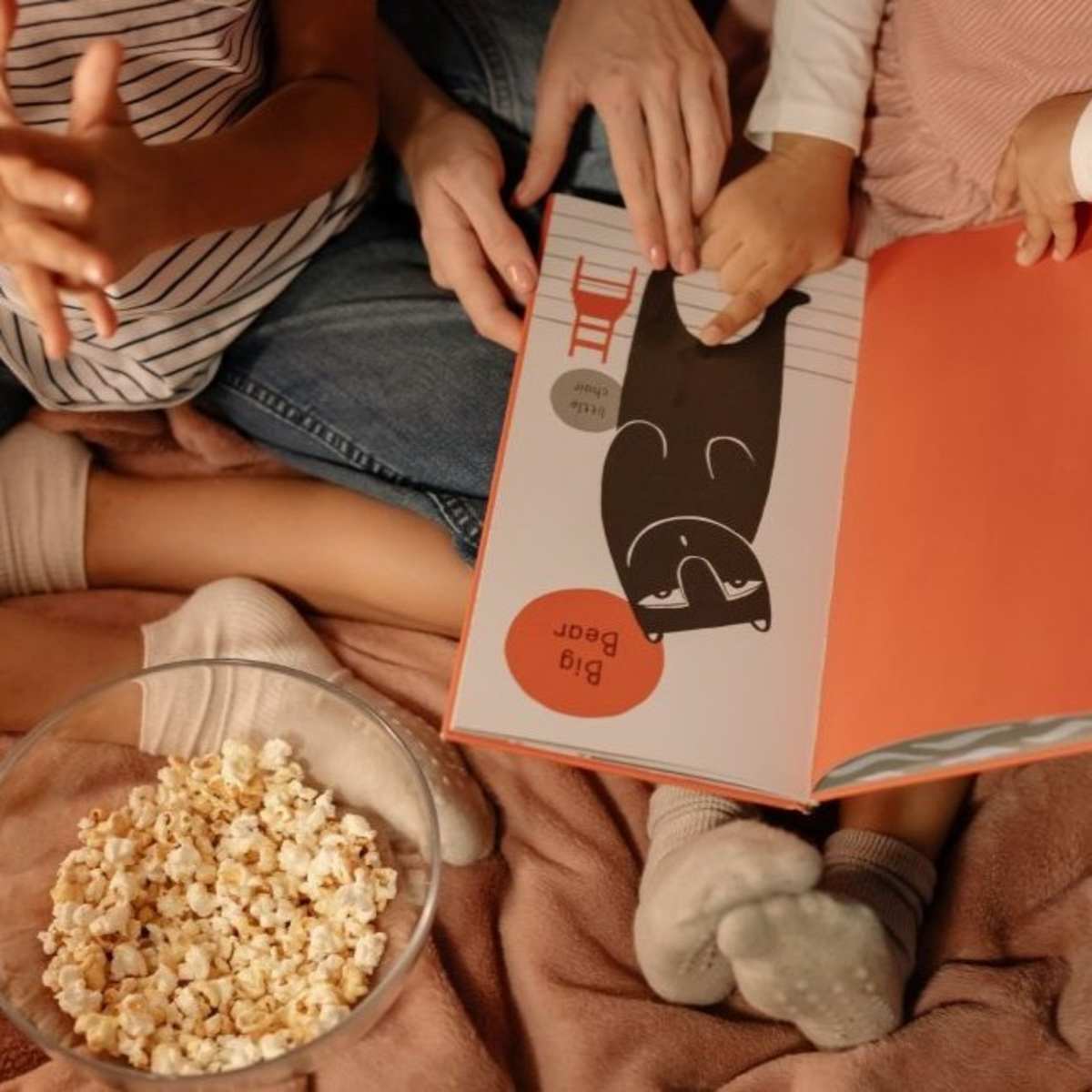 Family reading book together