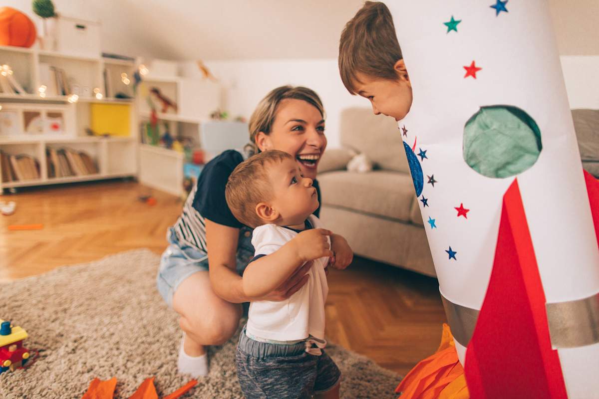 Mum playing with her two kids