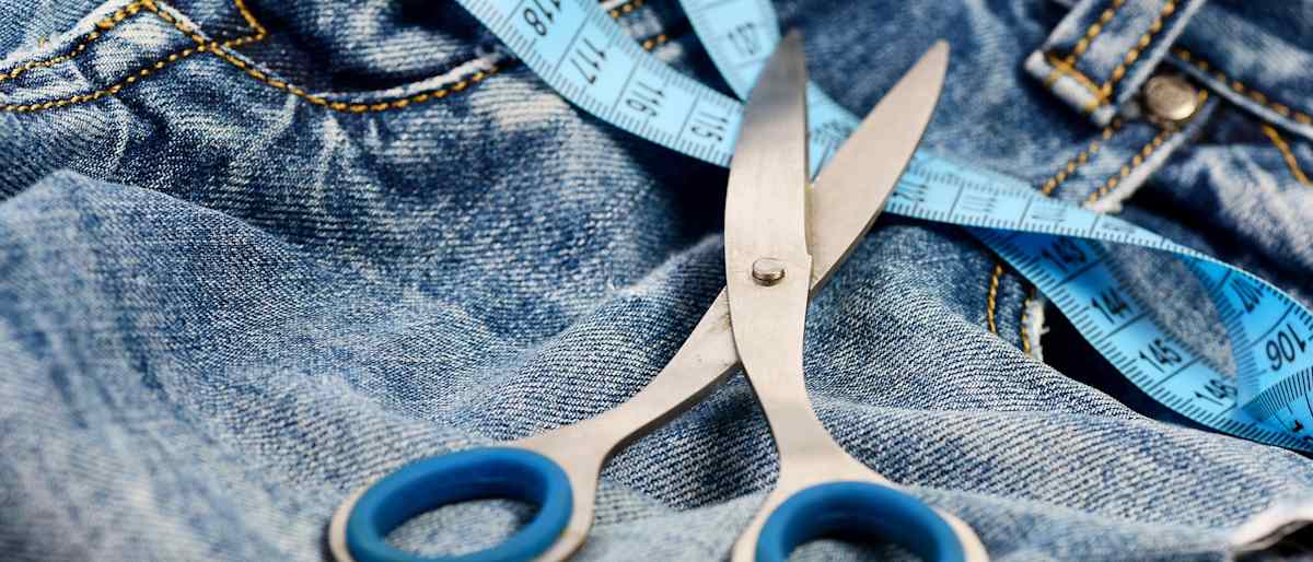 Denim, tape measure and scissors