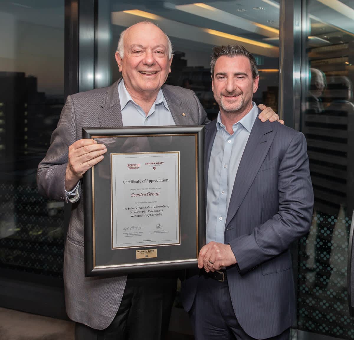 Scentre Group CEO, Elliot Rusanow, and retired Board Chair, Mr Brian Schwartz AM at new scholarship announcement..
