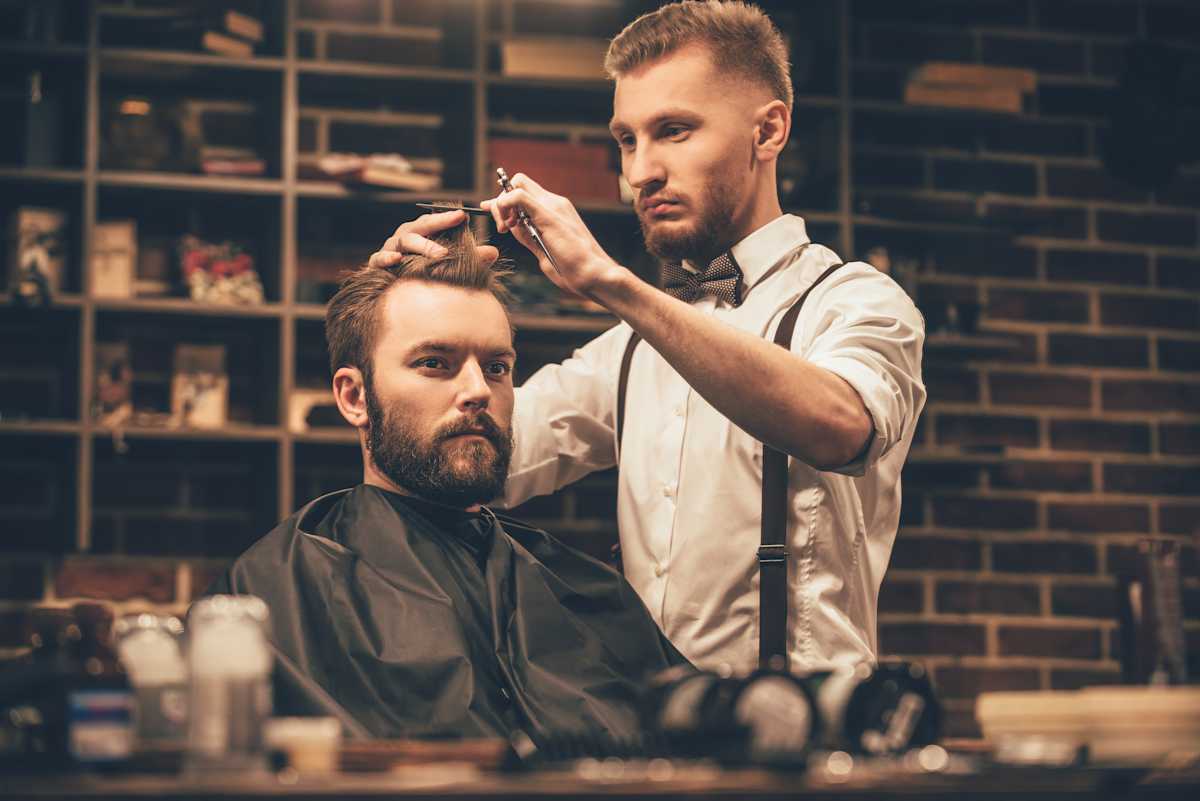 Man getting hair cut