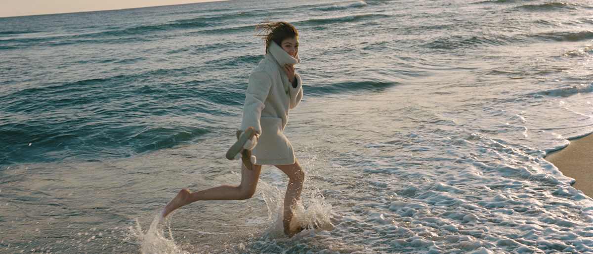 Girl running on the beach