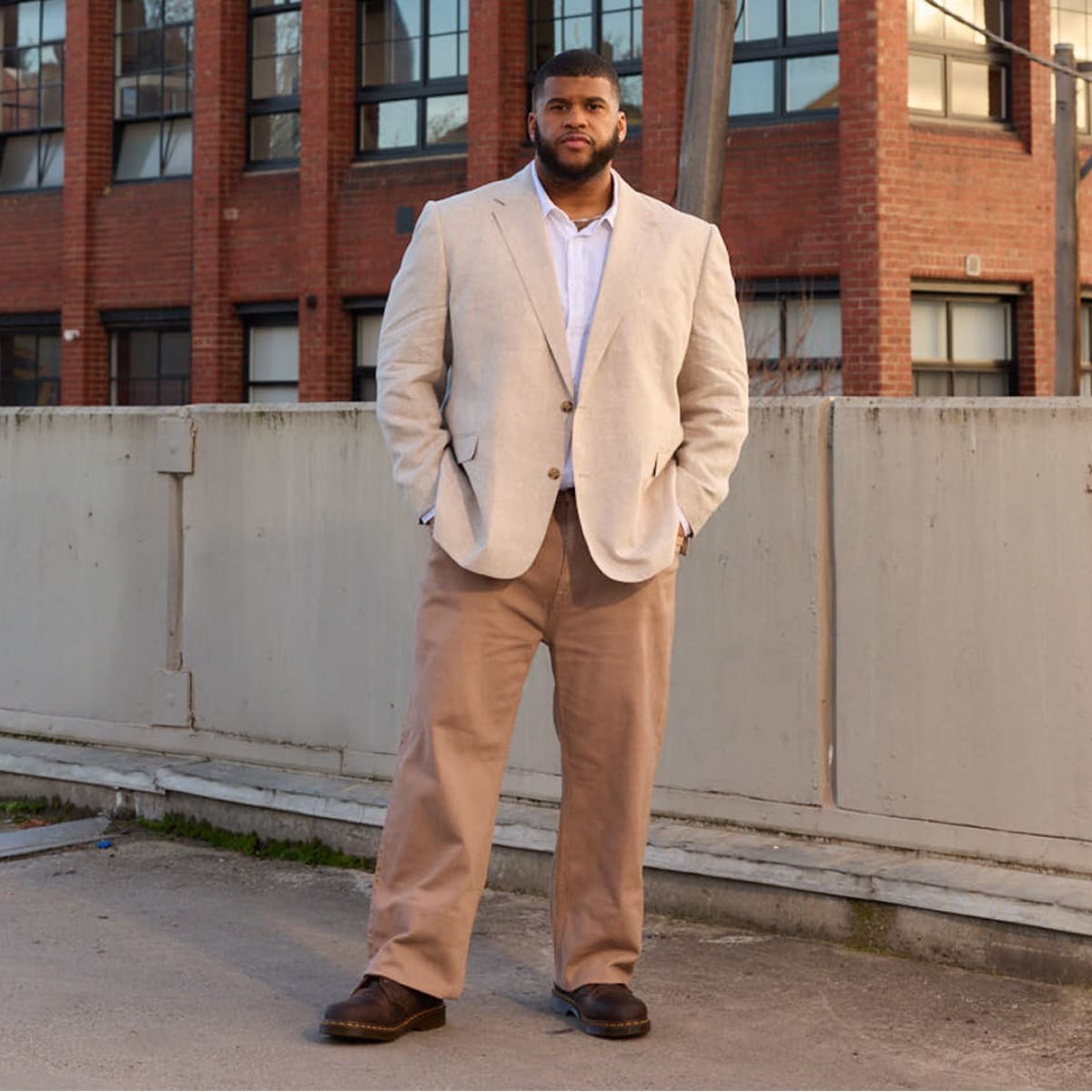 Male model wearing Johnny Bigg suit in rooftop car park