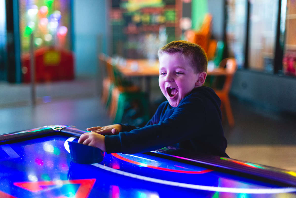 Young boy playing at iPlay