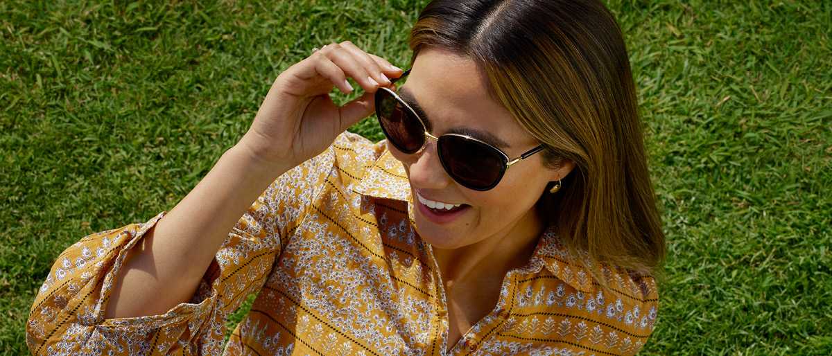 Woman on the grass in the sun
