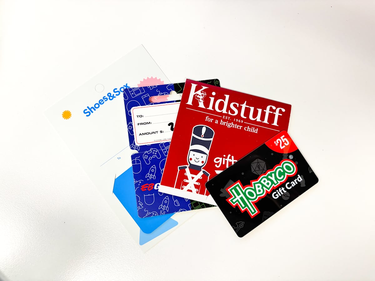 An image of several gift cards on a white background