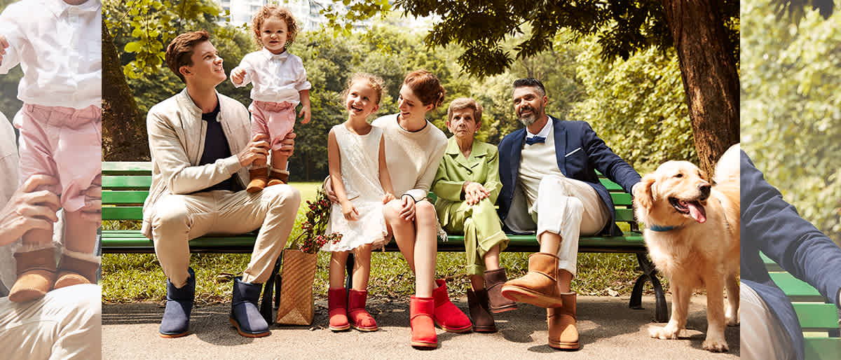 Family sitting on a park bench