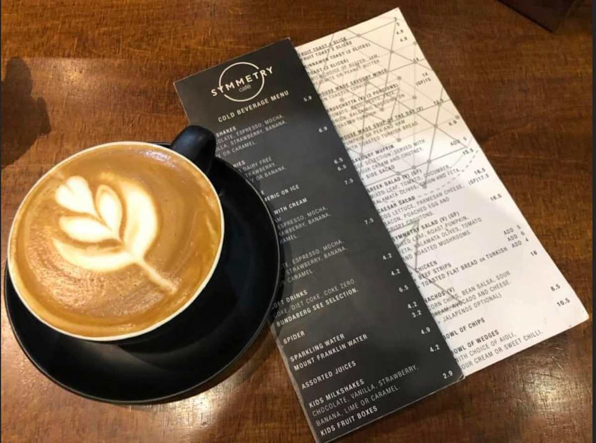Symmetry Cafe front banner