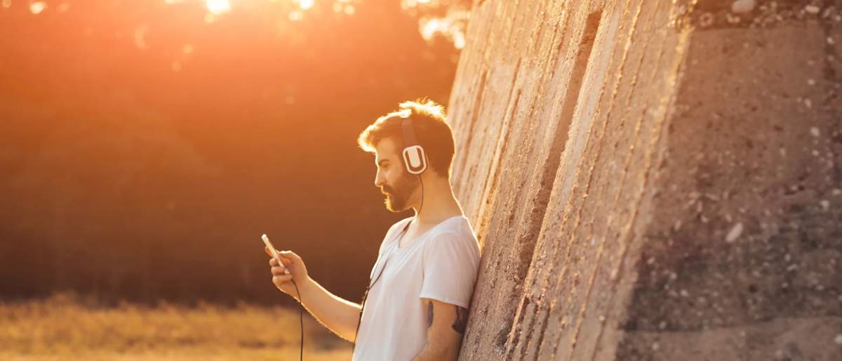 guy holding a phone outside