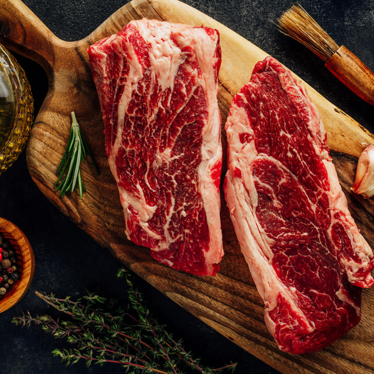 Red meat on a chopping board.