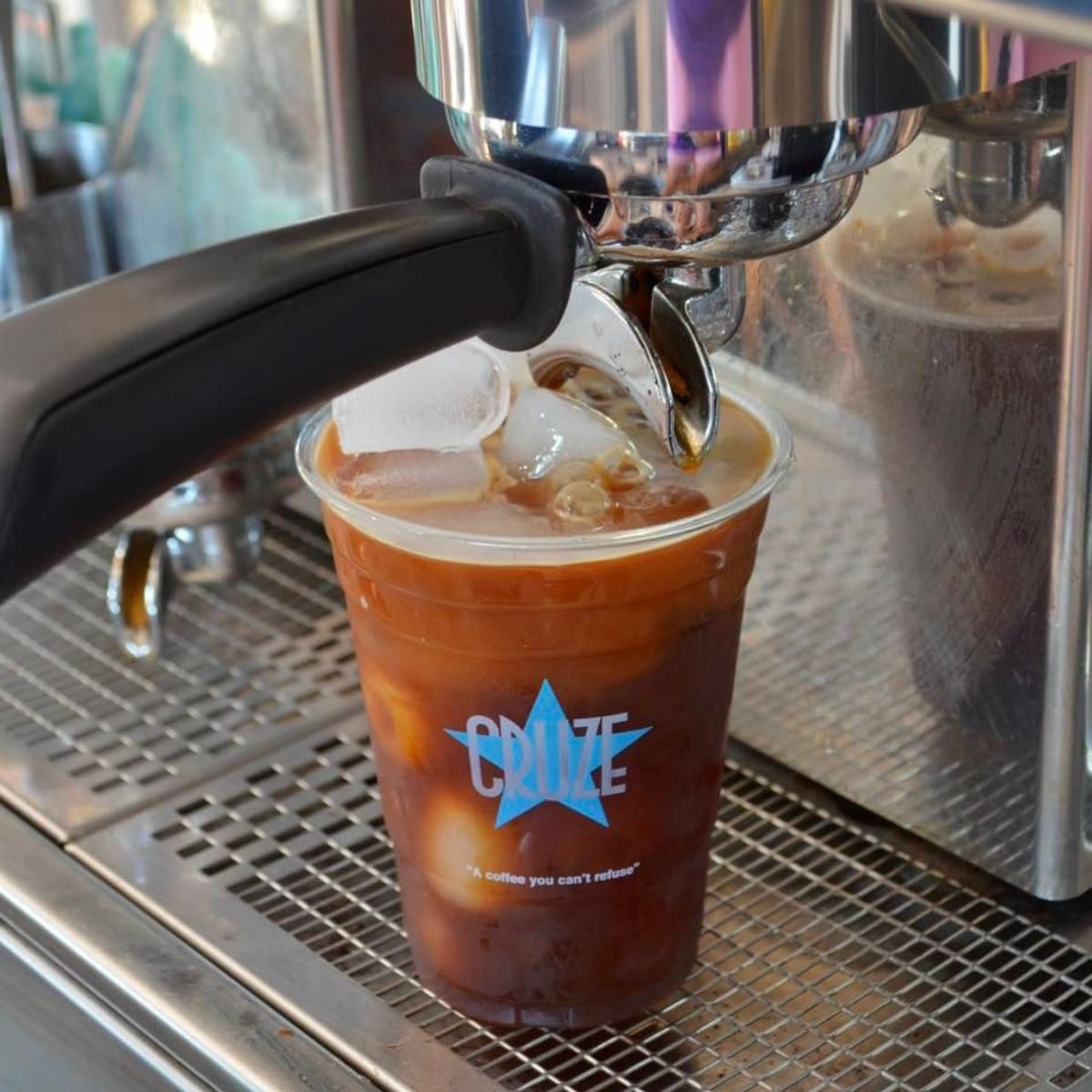 Iced Coffee being poured at coffee shop