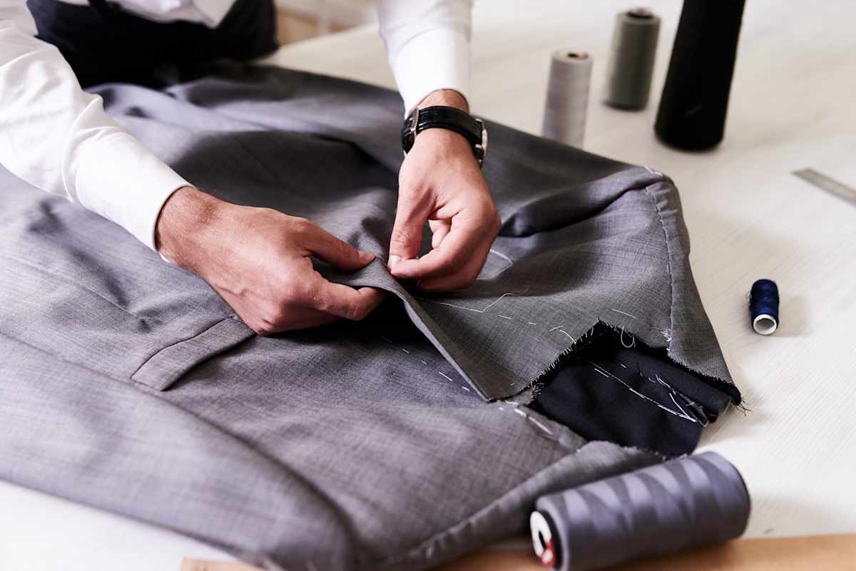 Suit jacket being altered