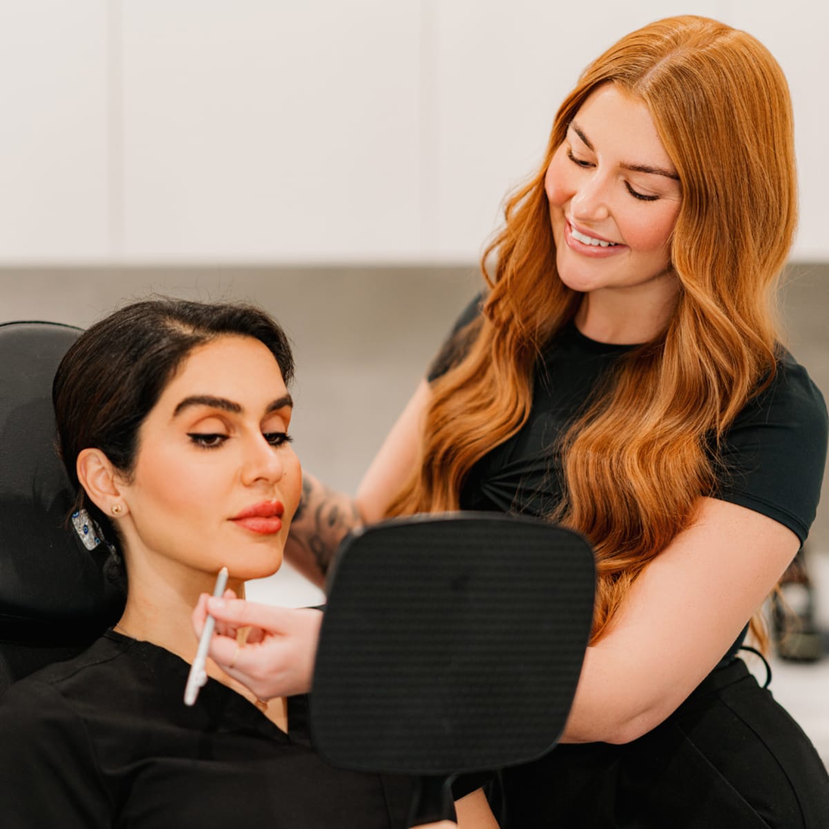MedAesthetics Cosmetic Clinics team member assisting a client.