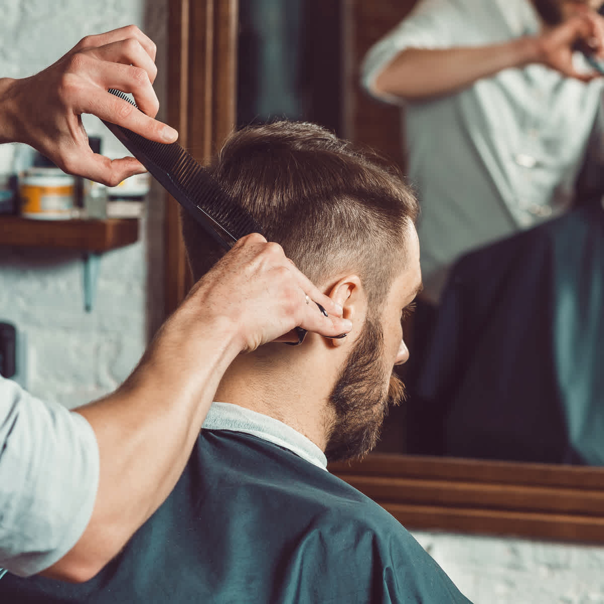 Barber shop - male getting haircut