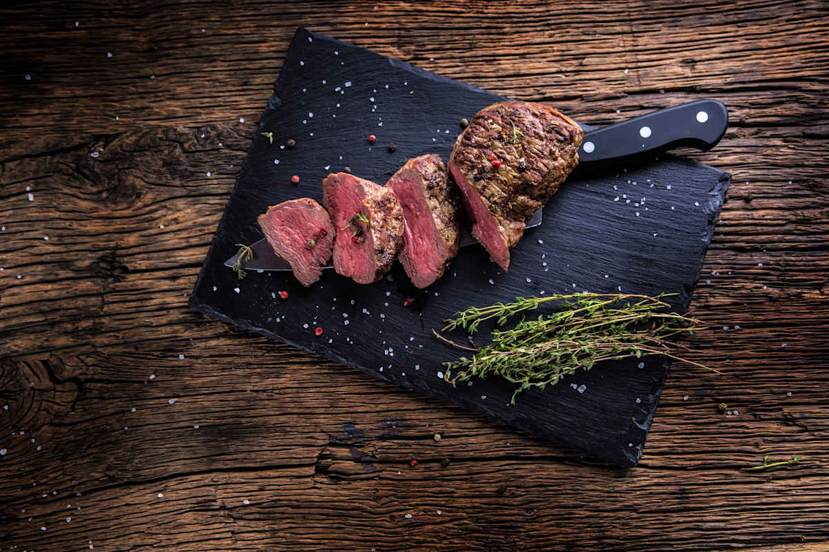 Cooked steak on a board 