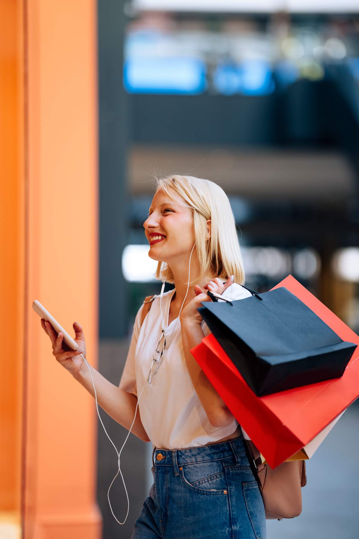 Westfield Membership lady carrying shopping bags