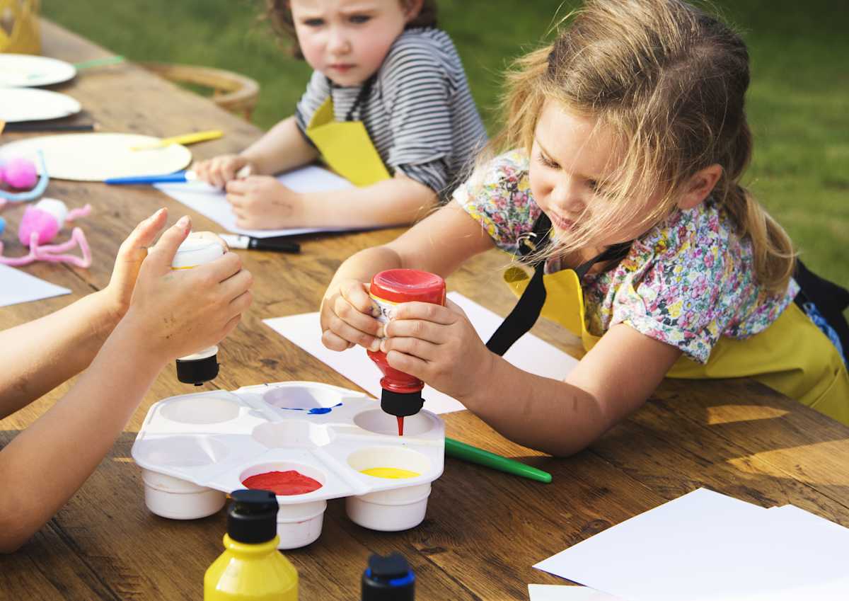 Two children completing a craft activity