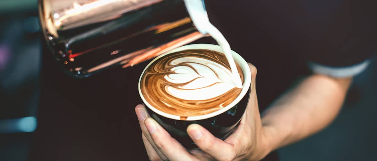 Barista making coffee