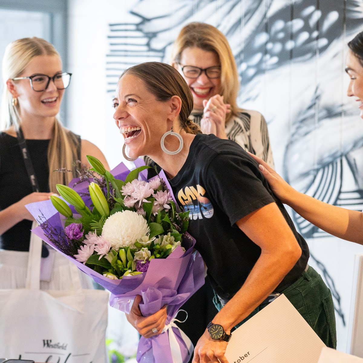 Women celebrating local heroes