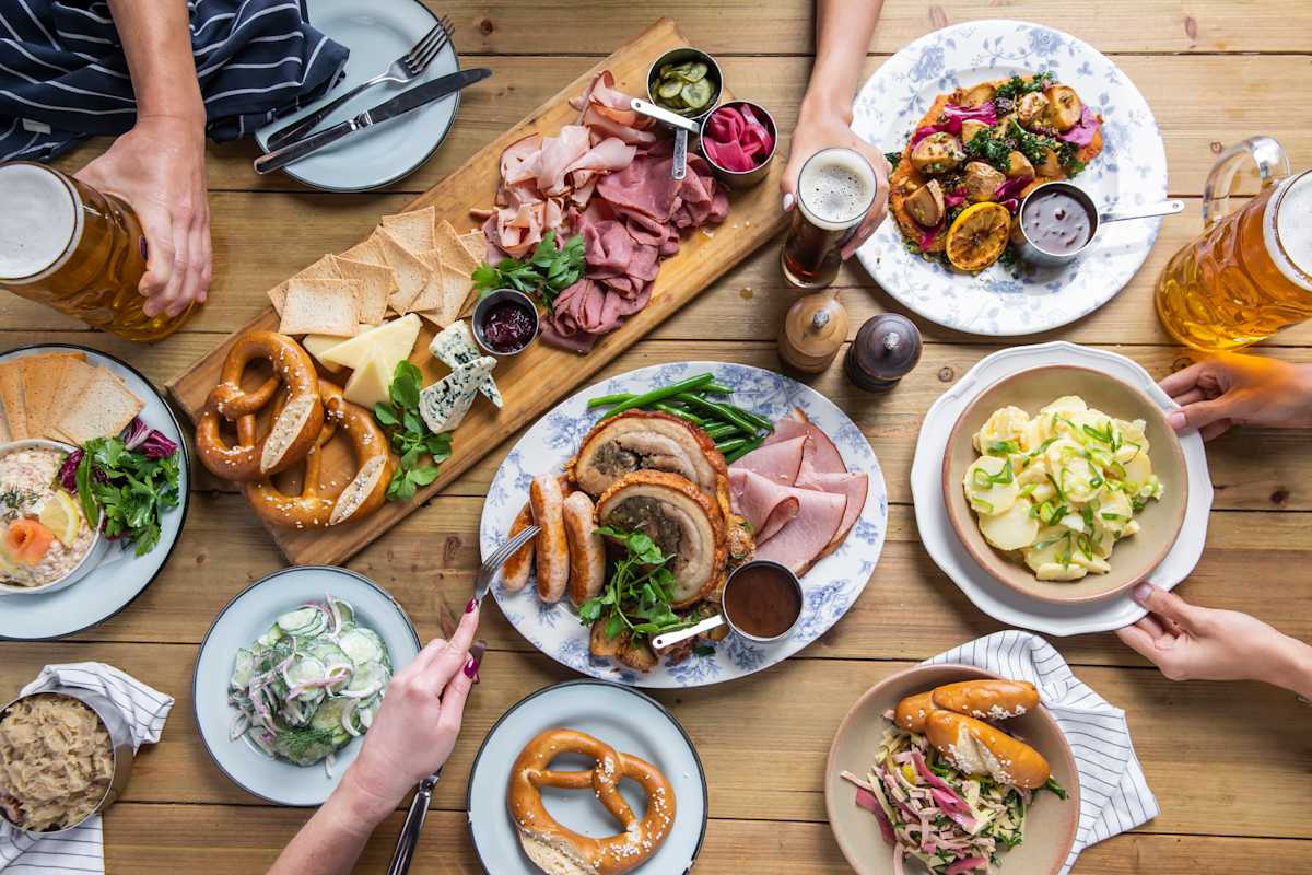 Christmas Platter, Cold Meats and Cheese Board, Christmas Schnitzel, Potato Salat, Wurst Salat, Cucumber Salat, Potted Smoked Salmon - social version with hands