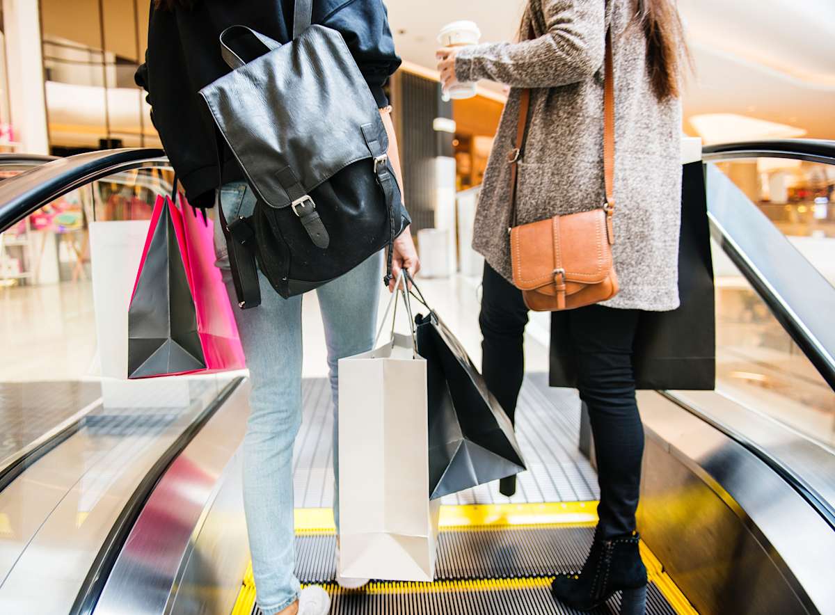 Bondi - stock image - escalator - bags - shopping