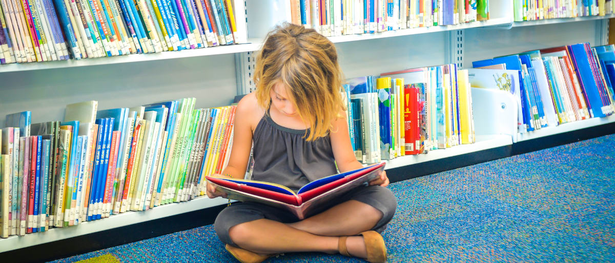 Getty Images_Kids sitting on floor in library_CRD_2026