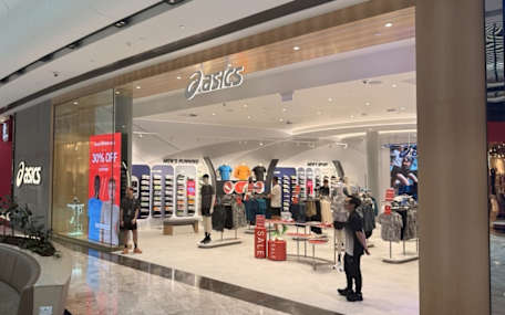 An image of the ASICS store storefront at Westfield Carousel.