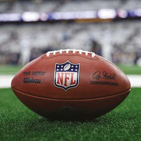 NFL ball on a pitch